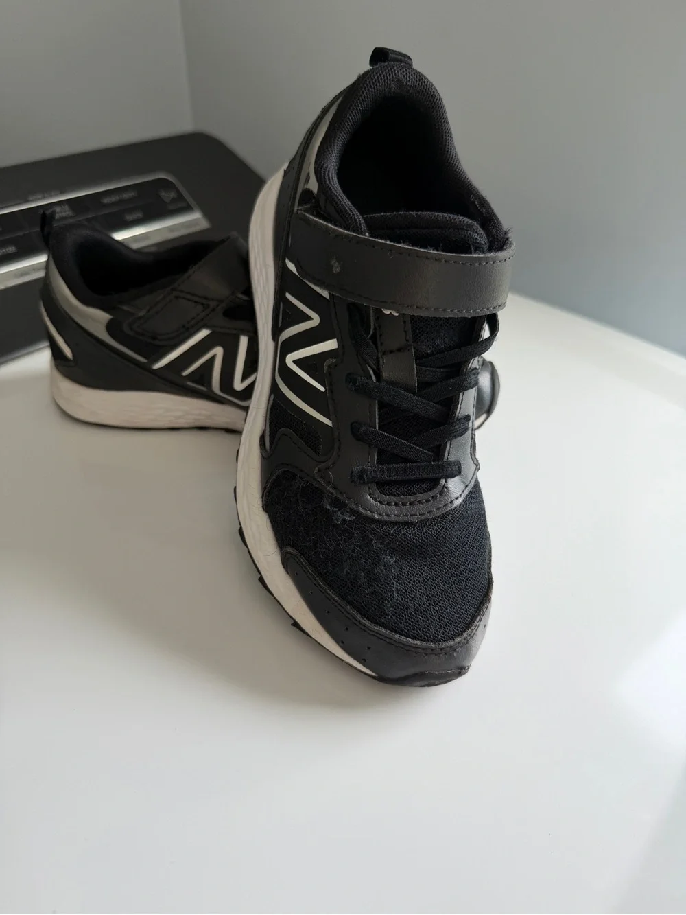 New Balance Kids Black and White Sneakers